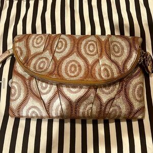 Henri Bendel ,  wristlet/clutch... Rare…Beautiful pattern designed. New